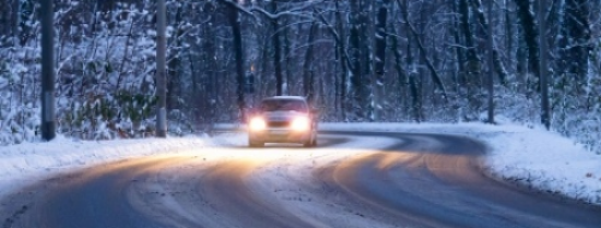 Car driving on snowy road habits success