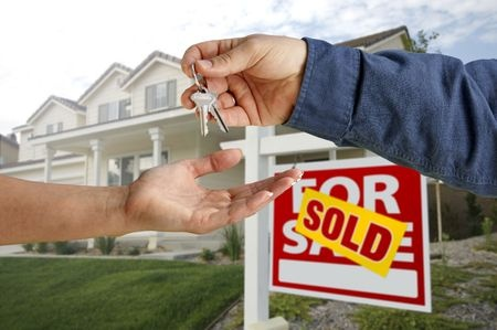 Real estate agents sold home with keys