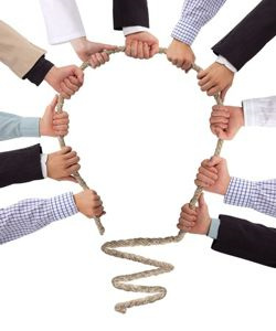 Connecting Team Holding Rope Light Bulb 