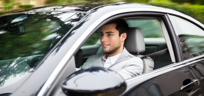Driving Revenue Through Sales Car - Man Driving