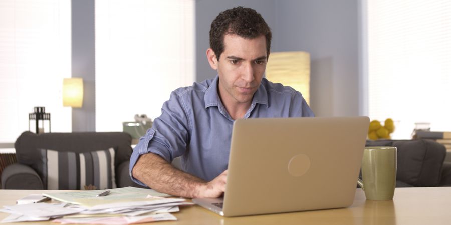 Young man doing his taxes