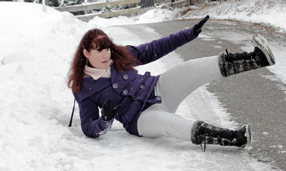 Be Careful - Woman Falling on Ice